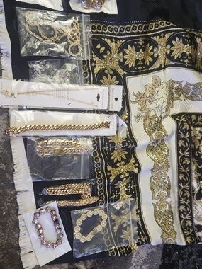 11 Bundle Fashion Jewelry. Three Gold-Tone And Silver Necklace 8 Bracelets.